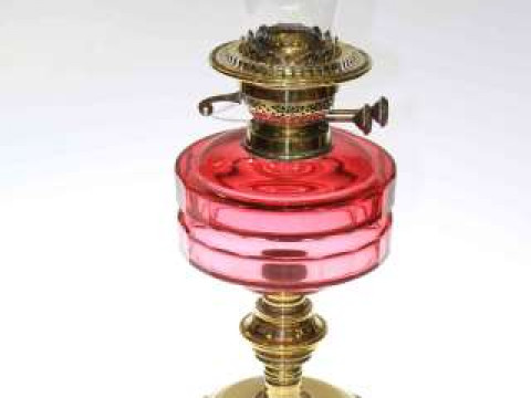 Victorian brass oil lamp with ruby reservoir