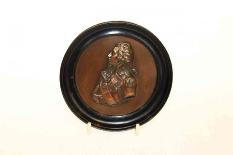 Circular bronze of Nelson in ebonised frame, 12.5cm diameter