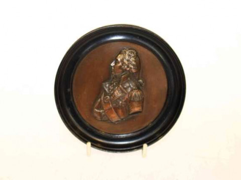Circular bronze of Nelson in ebonised frame, 12.5cm diameter