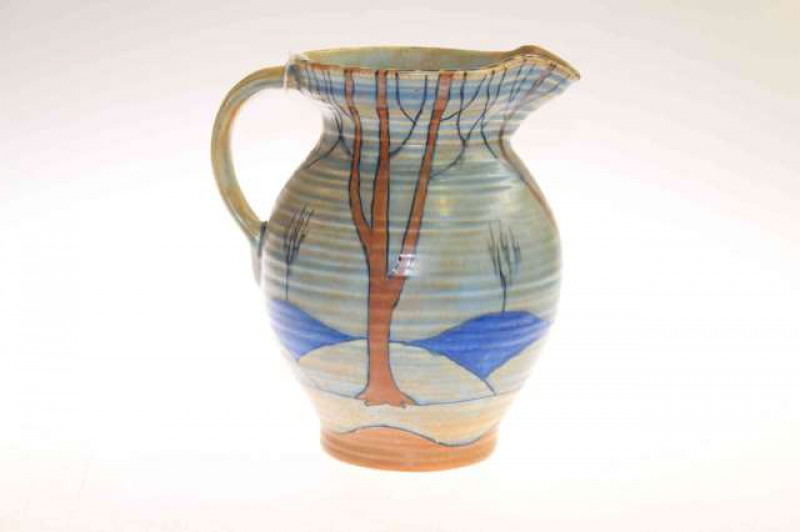 Burleigh Ware jug painted with trees and rolling hills, signed Bennett