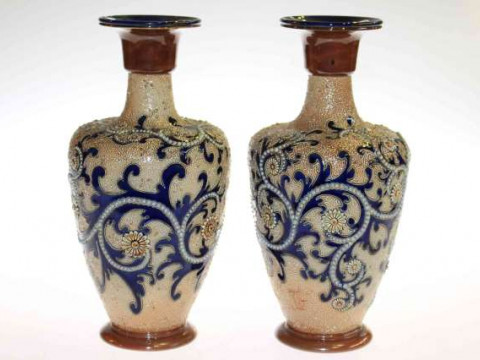 George Tinworth for Royal Doulton, a pair of stoneware vases with scrolling...