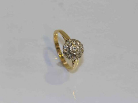 18 carat gold and diamond cluster ring