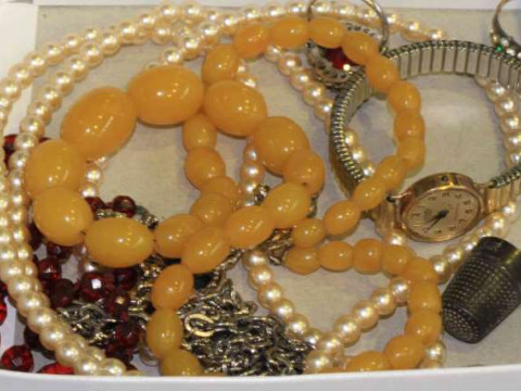 Amber coloured beads, thimble, red faceted beads etc