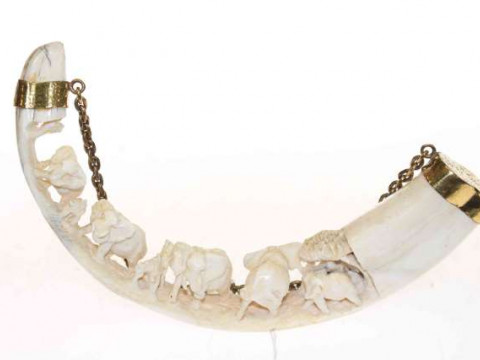 19th Century ivory tusk carved with elephants
