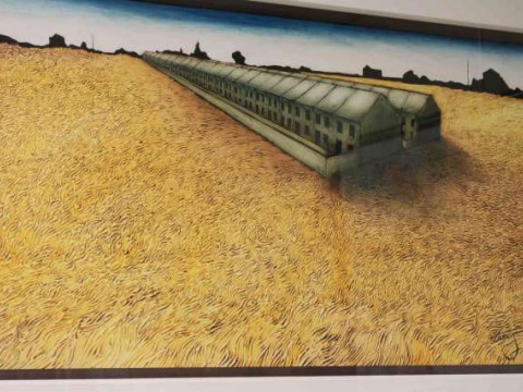 Lou Harris, Terraced houses in a golden landscape, signed lower right,...