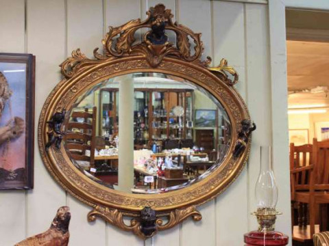 Period style gilt oval mirror