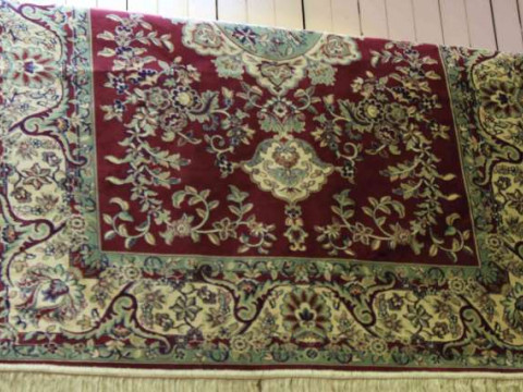 Keshan rug with a burgundy ground 2.00 x 1.40