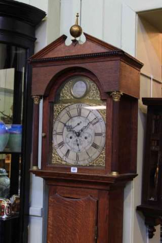 George III oak eight day longcase clock having brass and silvered arched dial, signed Thomas Arlot, Sunderland