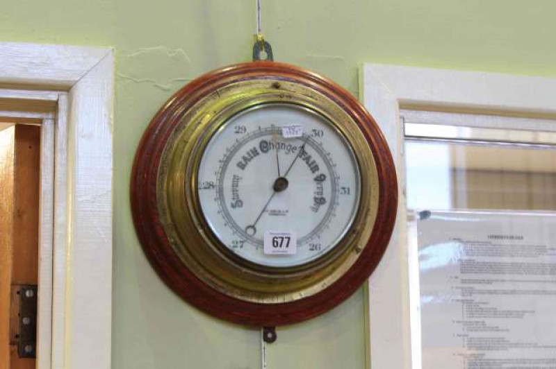 Edwardian ships bulkhead barometer having enamelled dial signed John Barker & Co. Kensington