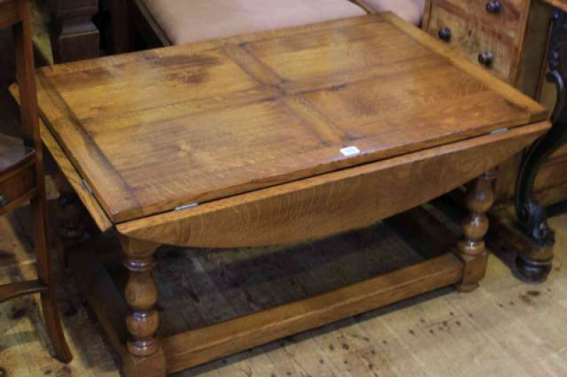 Jointed oak drop side coffee table