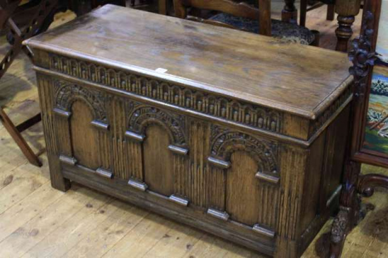 Carved oak triple arched panel front coffer