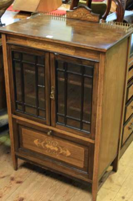 Late Victorian rosewood and satinwood inlaid music cabinet having two bevelled glass panel doors above a full front cupboard