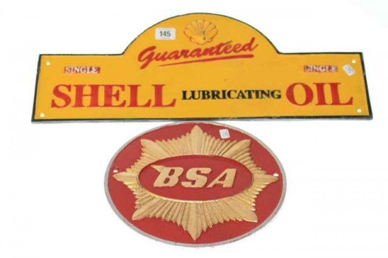 B.S.A. and Shell Oil cast metal signs