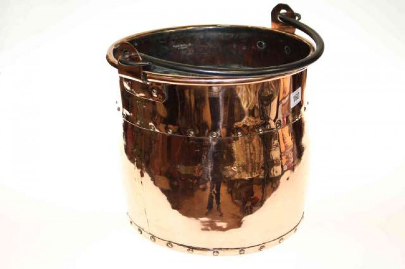 Highly polished copper log bin with cast handle