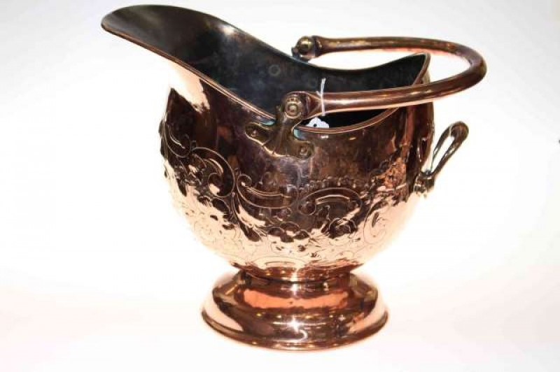 Highly polished copper swing handled coal scuttle with embossed decoration