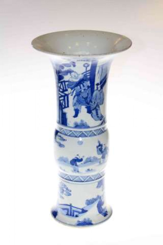 Chinese Gu shaped blue and white vase with figural decoration having blue circle marks to the base