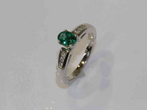 18 carat gold, emerald and diamond ring, emerald approximately 0.99 carats