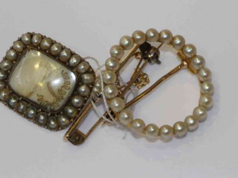 Three antique brooches, each set with pearls (unwarranted and untested)