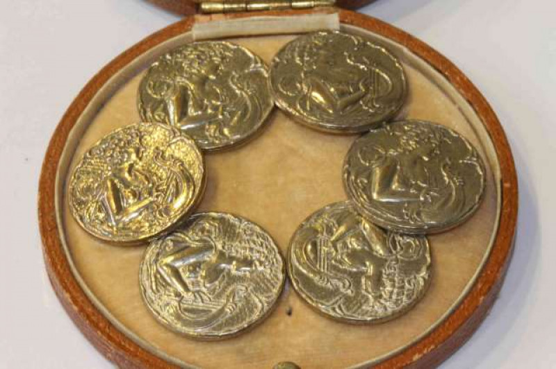 Set of six Art Nouveau silvered metal buttons, each stamped Liberty into a crown, boxed