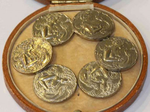 Set of six Art Nouveau silvered metal buttons, each stamped Liberty into...