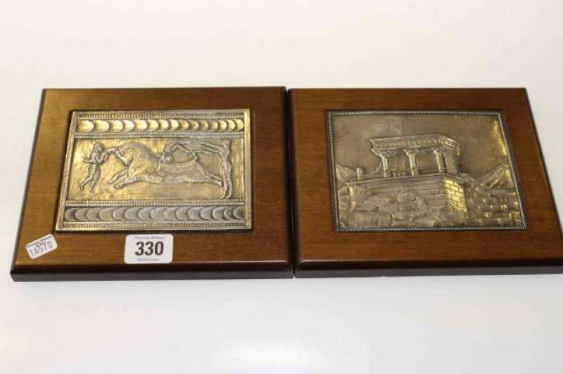 Pair of Astron white metal plaques