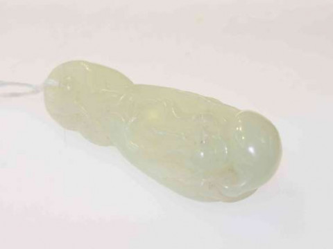 A Chinese jadeite pendant, carved as a Shou Lao, 7.5cm
