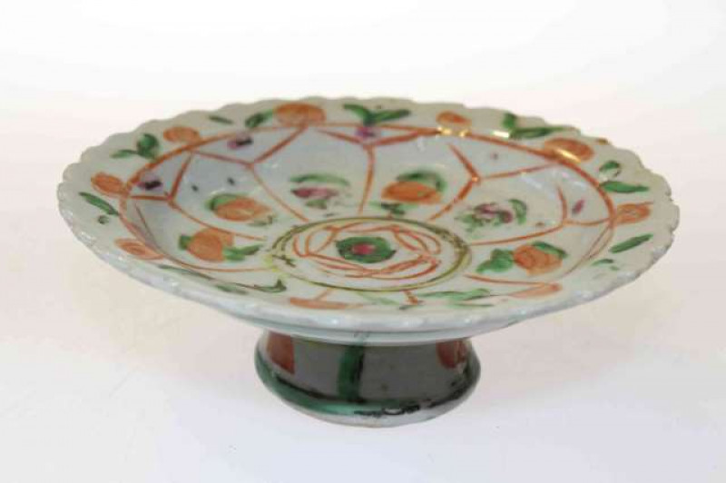 Unusual footed dish with scalloped edge