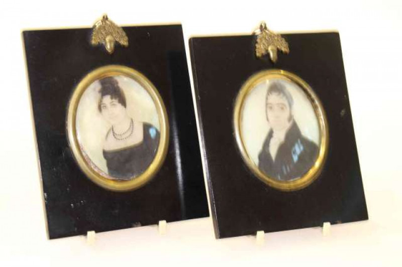 Two 19th Century portrait miniatures on ivory, in ebonised frames