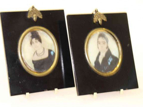 Two 19th Century portrait miniatures on ivory, in ebonised frames