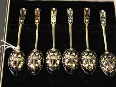 Set of six silver gilt and enamel coffee spoons, cased