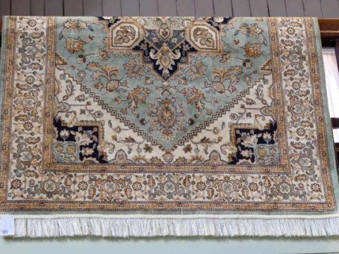 Heriz green ground rug 1.90 x 1.40 metres