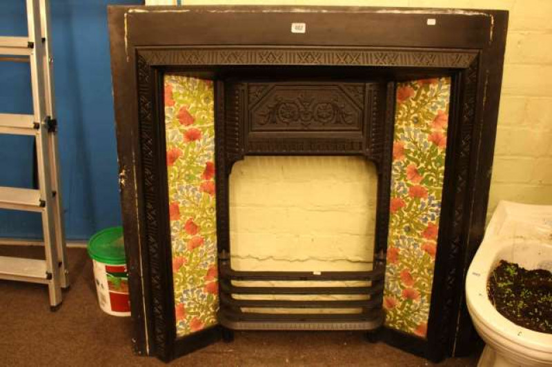 Cast iron and tiled fire place