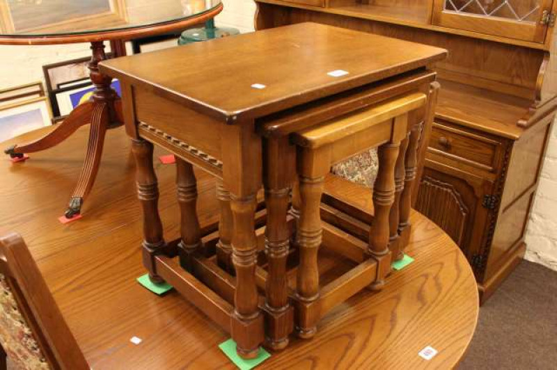Nest of three oak turned leg tables