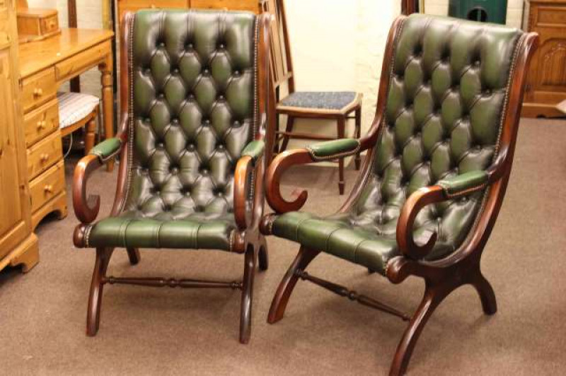 Pair of mahogany framed green button leather fireside armchairs