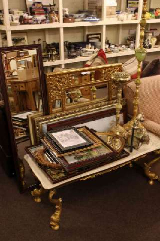 Onyx coffee table, telephone, standard lamp and smokers stand and a collection of mirrors and pictures
