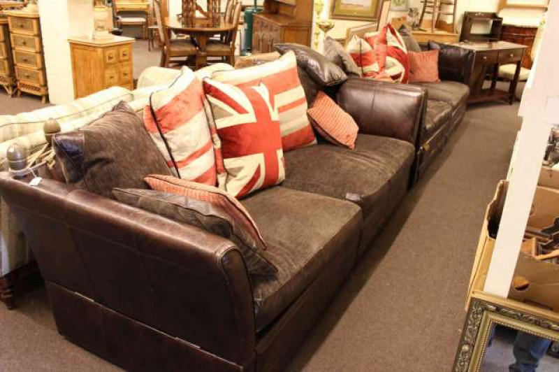Two large brown leather and upholstered Knoll style settee's