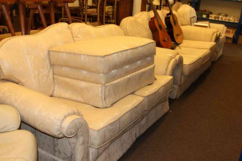 Four piece lounge suite comprising three seater, two seater settee, easy chair and footstool in light classical fabric