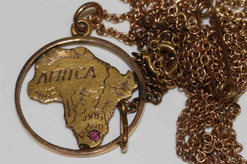 South African 9 carat gold fob and chain, gross 8 grams