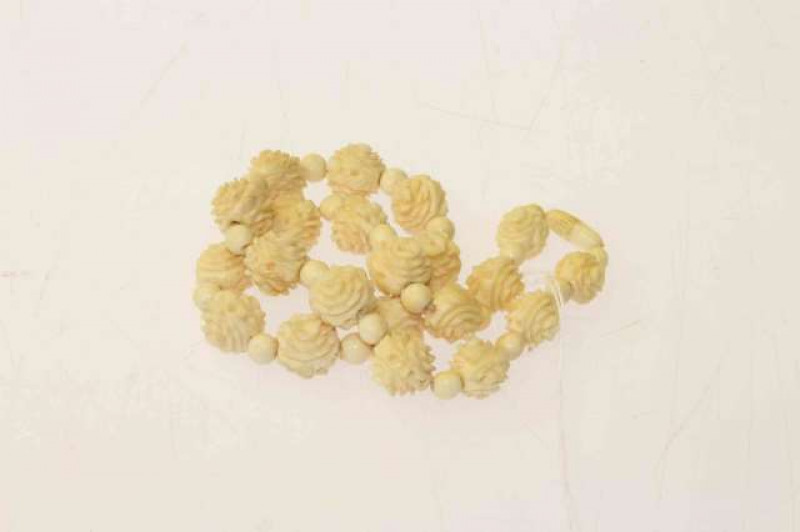 Chinese carved ivory bead necklaces, late 19th Century