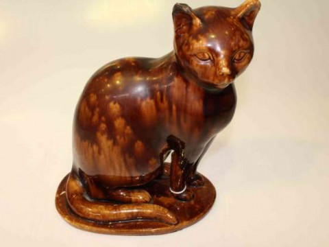 Canney Hill Pottery (Bishop Auckland), model of a seated cat, (a/f)