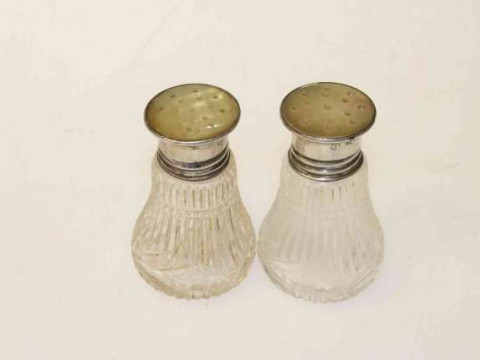 Pair of silver and mother-of-pearl topped pepper pots