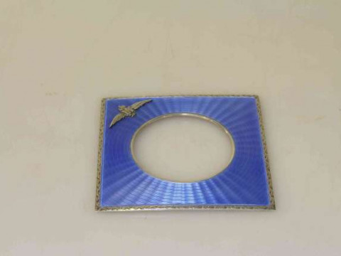 Silver and enamel surround from a strut clock, with RAF insignia