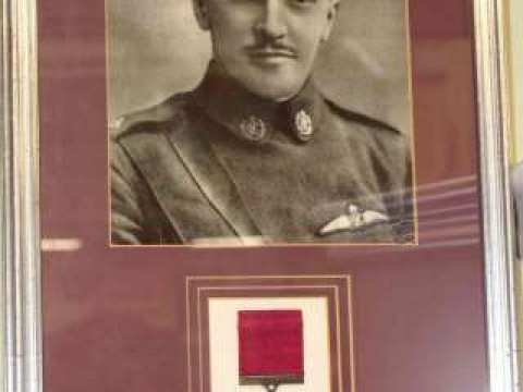 Replica Victoria Cross, framed and mounted with photograph