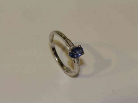 18 carat gold, sapphire and diamond ring, sapphire approximately 0.60...