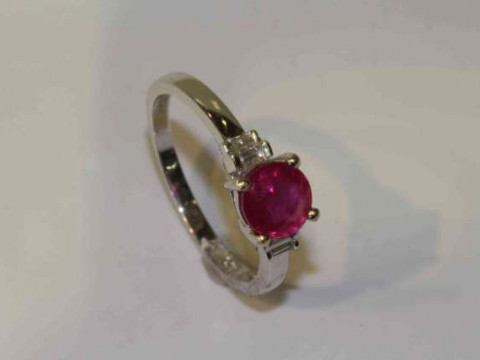 18 carat gold, ruby and diamond ring, ruby approximately 0.80 carats,...