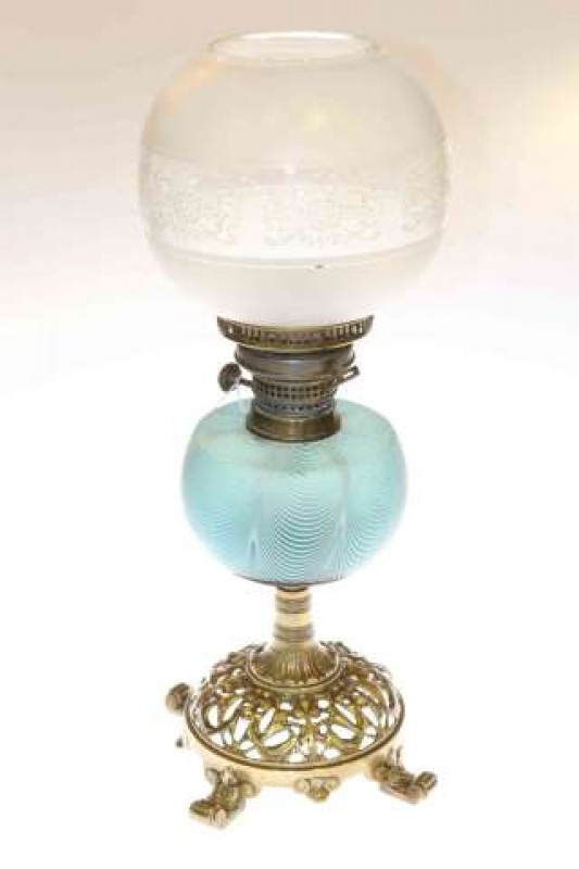 Victorian ornate pierced brass based oil lamp with Nailsea glass reservoir and etched and frosted shade