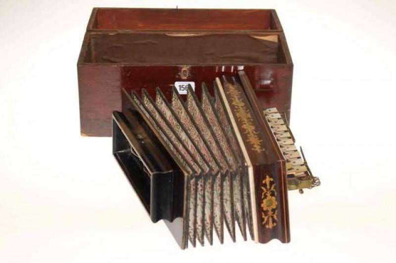 Inlaid rosewood accordion with mother of pearl and brass button in mahogany case
