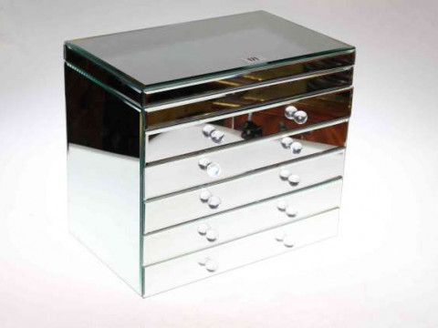 Mirrored jewellery cabinet with lidded top above four drawers