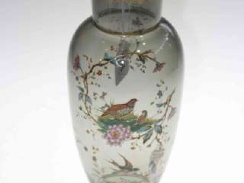 Gilt and enamel decorated glass vase with birds and foliage