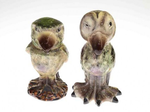 Two glazed pottery character birds with loose heads